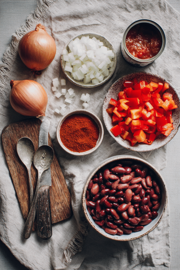 Flat lay of fresh ingredients for 5 ingredient vegetarian chili